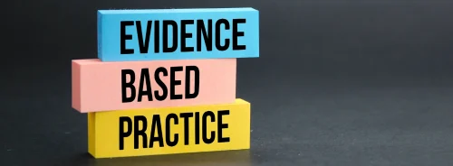  Stacked blocks reading “Evidence Based Practice” on a dark background.