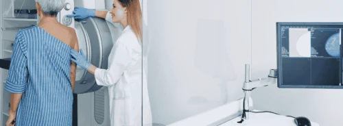 Patient undergoing a mammography exam, supporting breast cancer screening, women’s health assessment and diagnostic imaging.