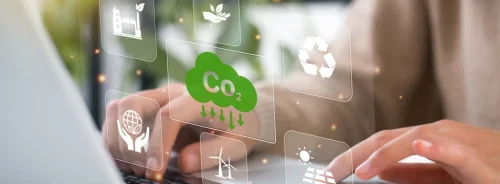 Digital sustainability concept with CO₂ reduction icons, supporting low-carbon healthcare, environmental reporting and green transformation.