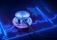 Stethoscope on digital ECG monitor screen symbolising modern cardiology and heart health diagnostics 