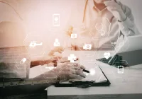  Clinicians reviewing charts together with AI and digital health icons overlaid.