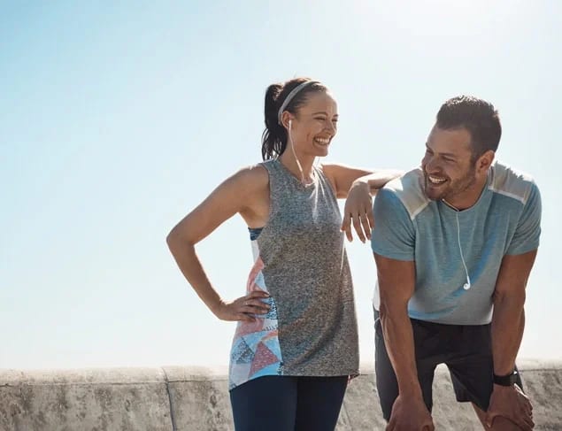 Happy couple after completing a run