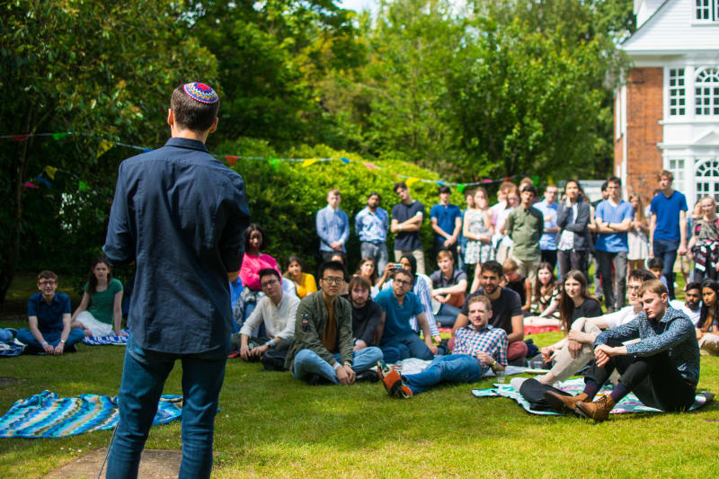 (Image) George talks during the garden party.