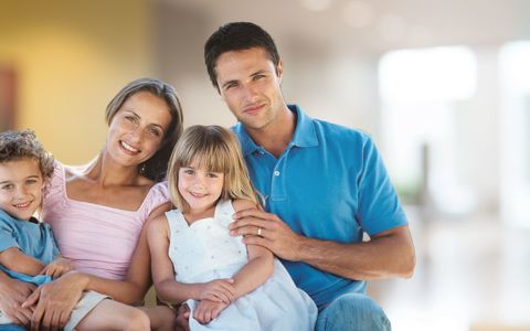 Photo of smiling family