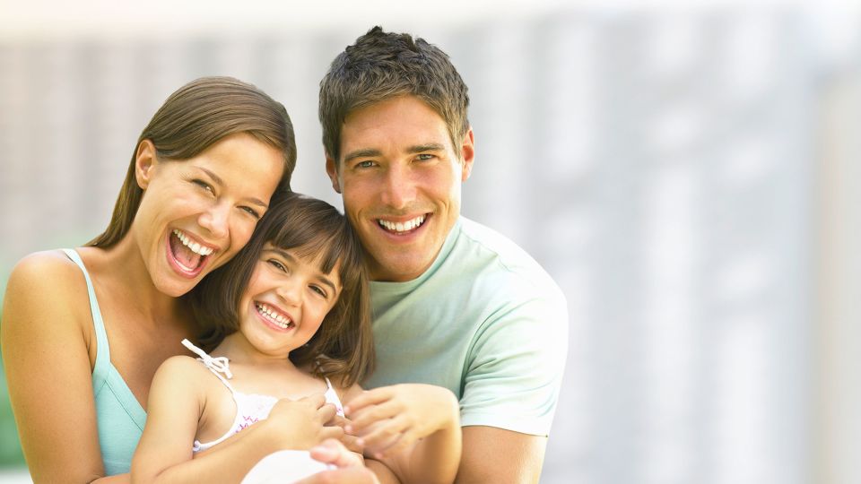 Photo of smiling family