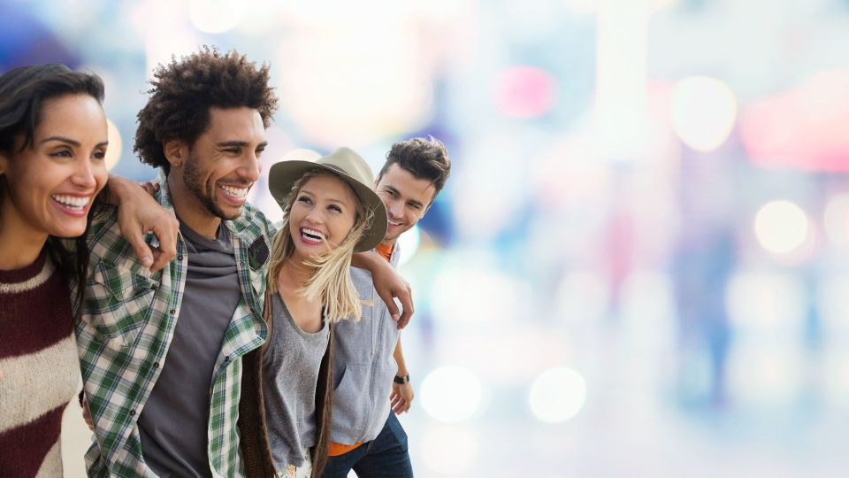 Photo of a smiling group of four friends