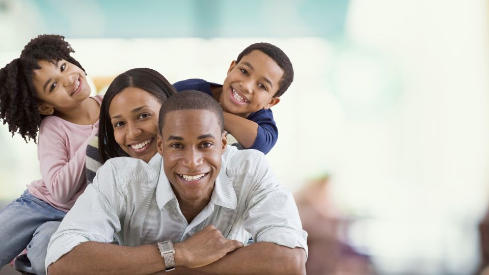 Photo of smiling family