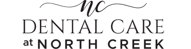 Dental Care at North Creek logo