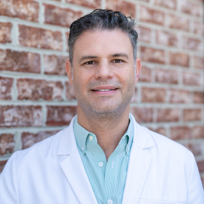 Andres Guirola, DDS