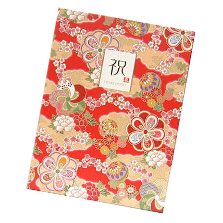 深いワインカラーのローズが印象的なアレンジです。