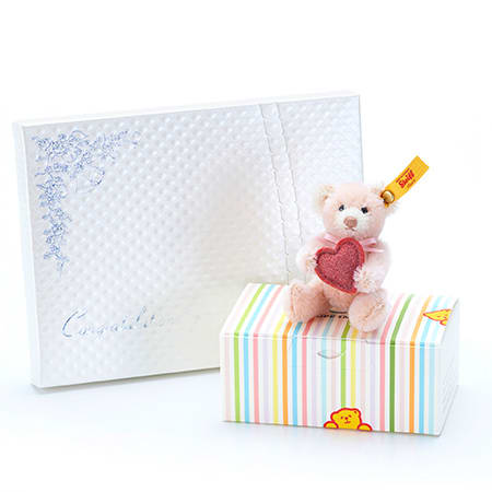 かわいいピンク色のテディベアです。