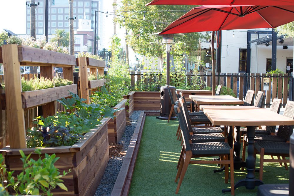 HP_PoppySeed_196L_web Garden Seating area at Poppy & Seed restaurant in Anaheim, CA full of raised garden beds | Photo by Nicole Kent