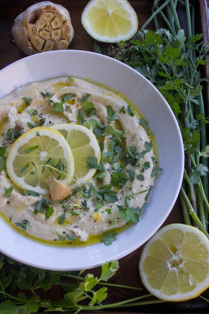 Lemon Garlic Hummus with roasted garlic, lemon paste, chives, parsley, and cilantro