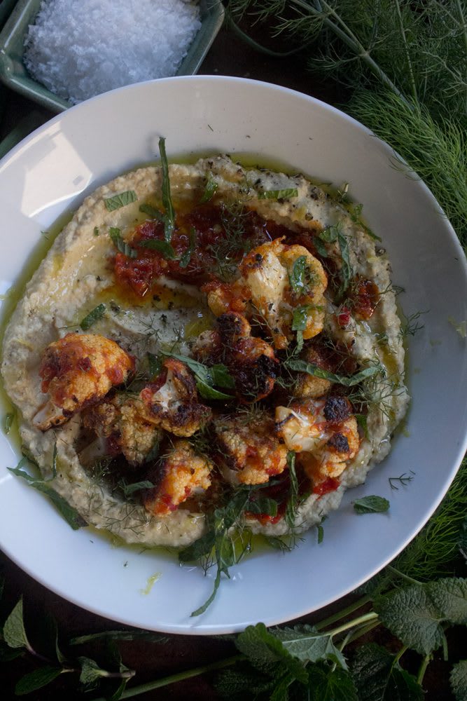 Harissa Cauliflower Hummus with dill, mint, and harissa