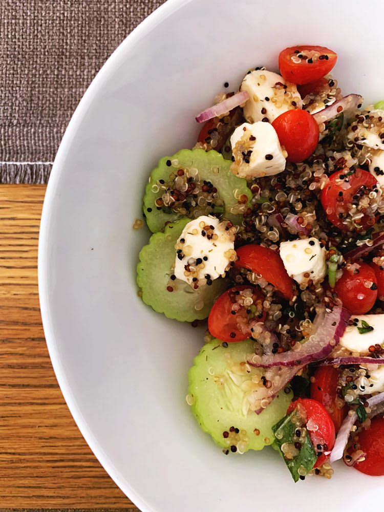 LemonBasilQuinoa_PlatedSalad_web Lemon Basil Quinoa salad with cherry tomatoes and cucumber plated in a bowl