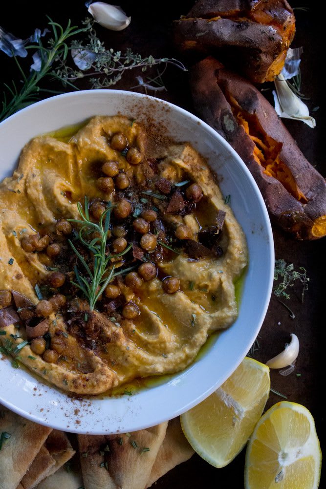 2022_RoastedSweetPotatoHummus_30web Roasted Sweet Potato Hummus plated with crispy chickpeas, rosemary, and roasted sweet potatoes on the side