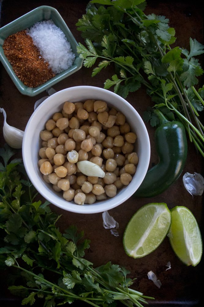 2022_TacoHummus_1web Raw ingredients for Taco Hummus | Garbanzo beans, taco seasoning, salt, cilantro, jalapeno, lime, and garlic clove