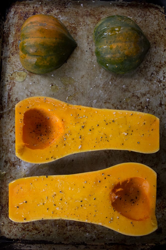 Ingredients for winter squash soup - prep squash by roasting it on one sheet pan
