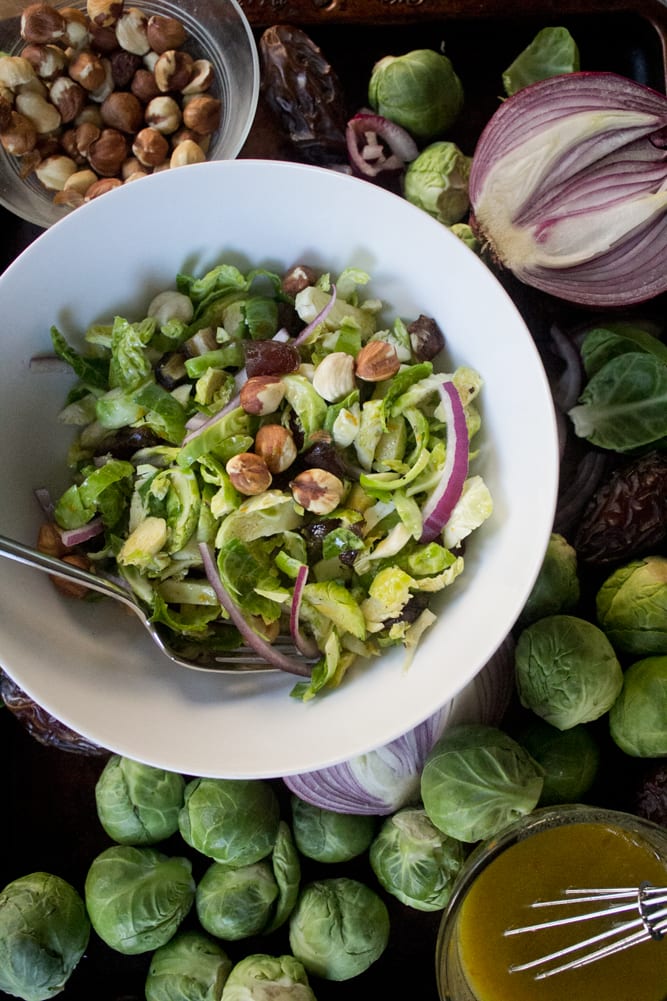 Brussels Sprout Salad with Bacon + Dates + Hazelnuts
