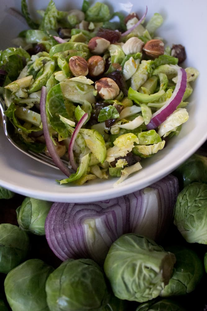 Brussels Sprout Salad with Bacon + Dates + Hazelnuts