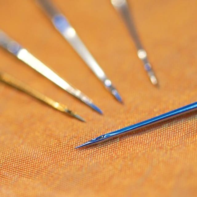Needles coated with titanium-nitride