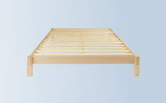A rendered image of the Madison Bed Frame on a light blue background gradient