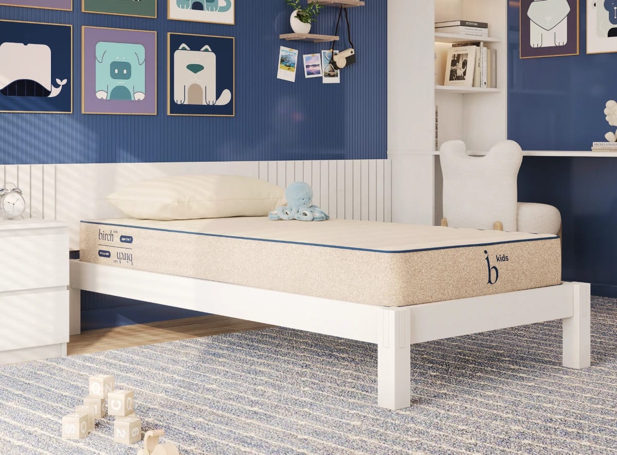 A rendered image of the Birch Kids Mattress in a bedroom setting.