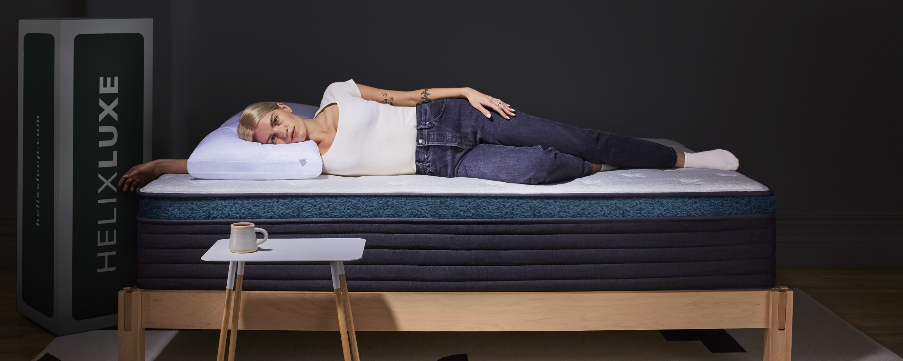 Woman Laying on Helix Sunset Luxe Mattress