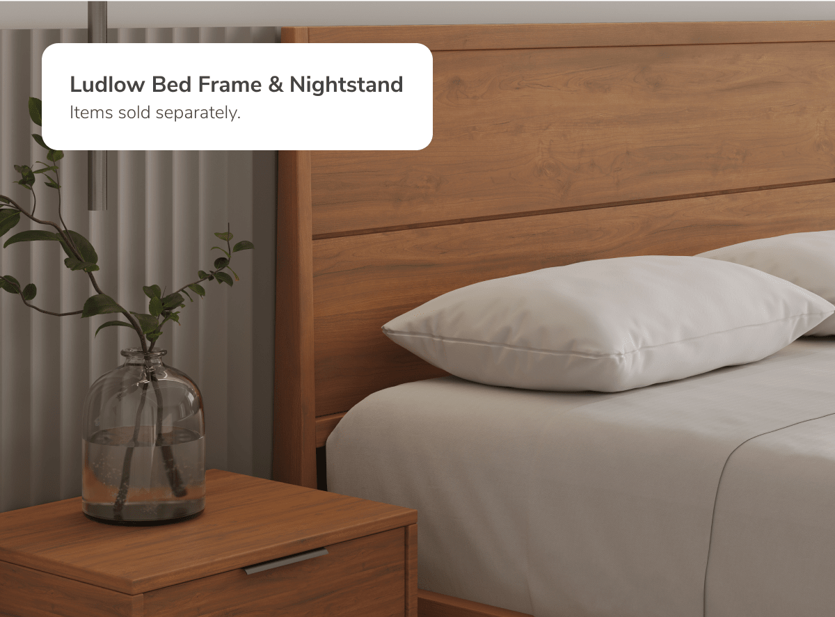 A closeup image of the Ludlow Bed Frame and Ludlow Nightstand with a callout explaining they are sold separately.