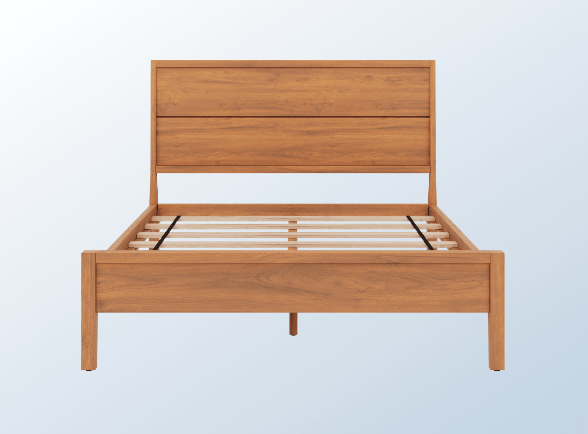 The Ludlow Bed Frame in Pecan on a blue gradient background