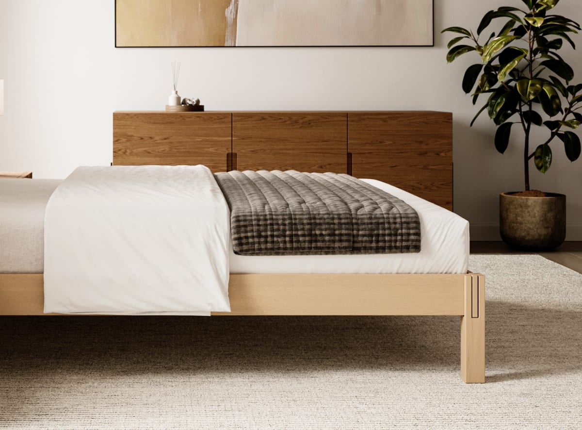 A rendered image of the Madison Bed Frame in a bedroom scene