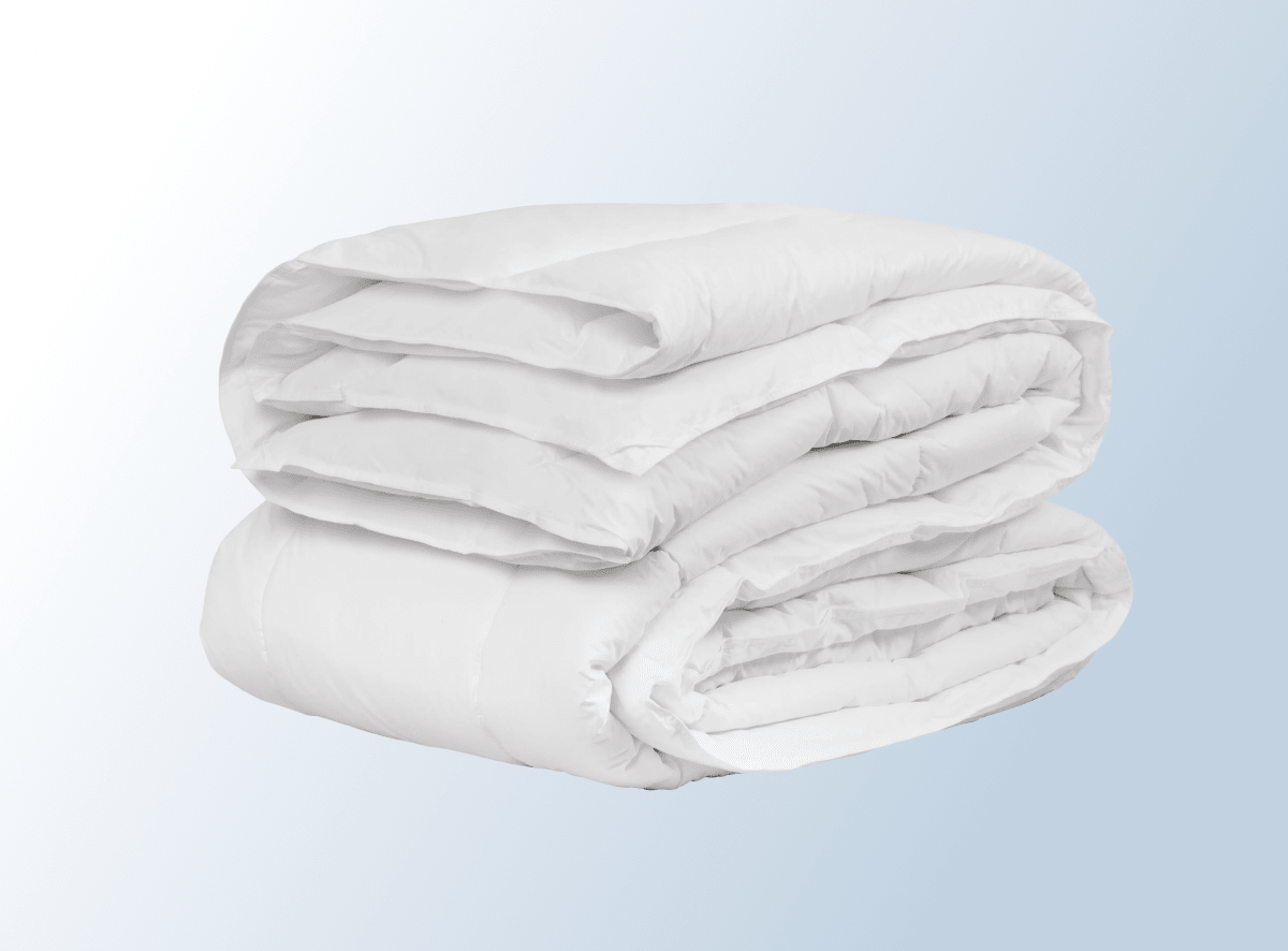 An image of the Duvet Insert folded on a light blue background gradient
