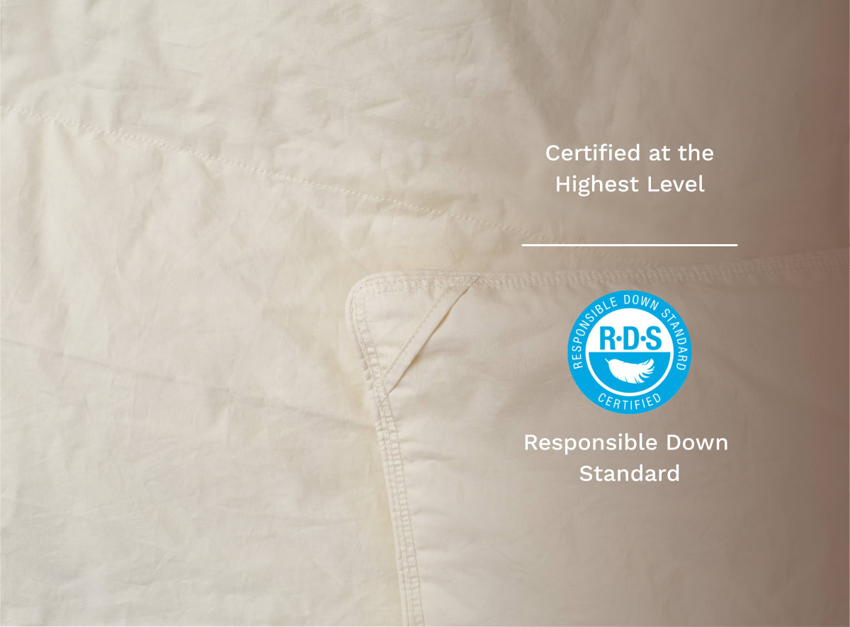 A closeup of the duvet insert featuring its Responsible Down Standard certification
