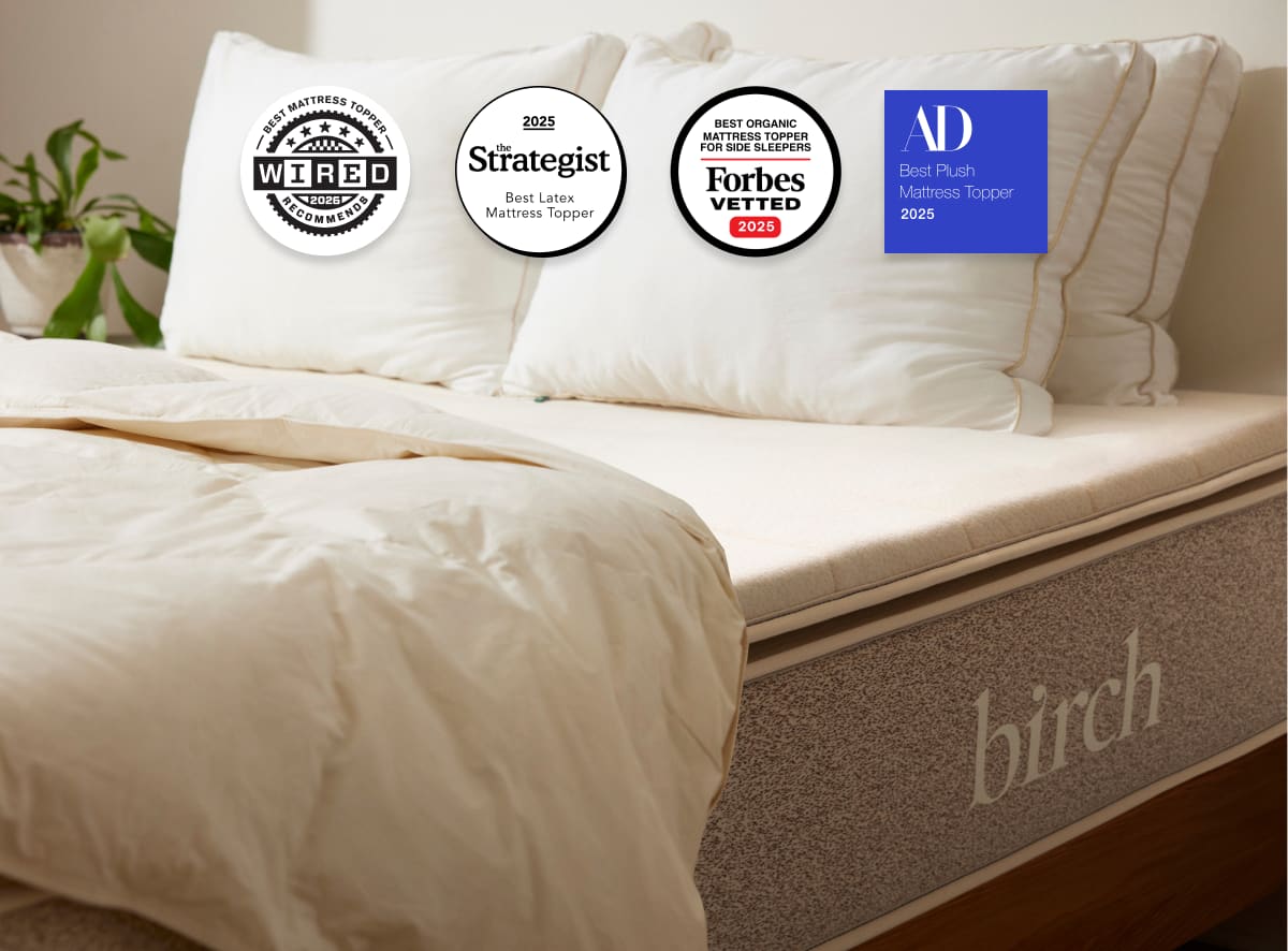 A rendered image of the Plush Organic Mattress Topper showing its awards and accolades