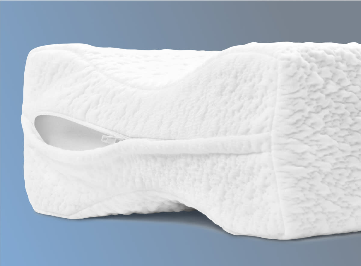 The Helix Side Sleeper Knee Pillow on a blue background