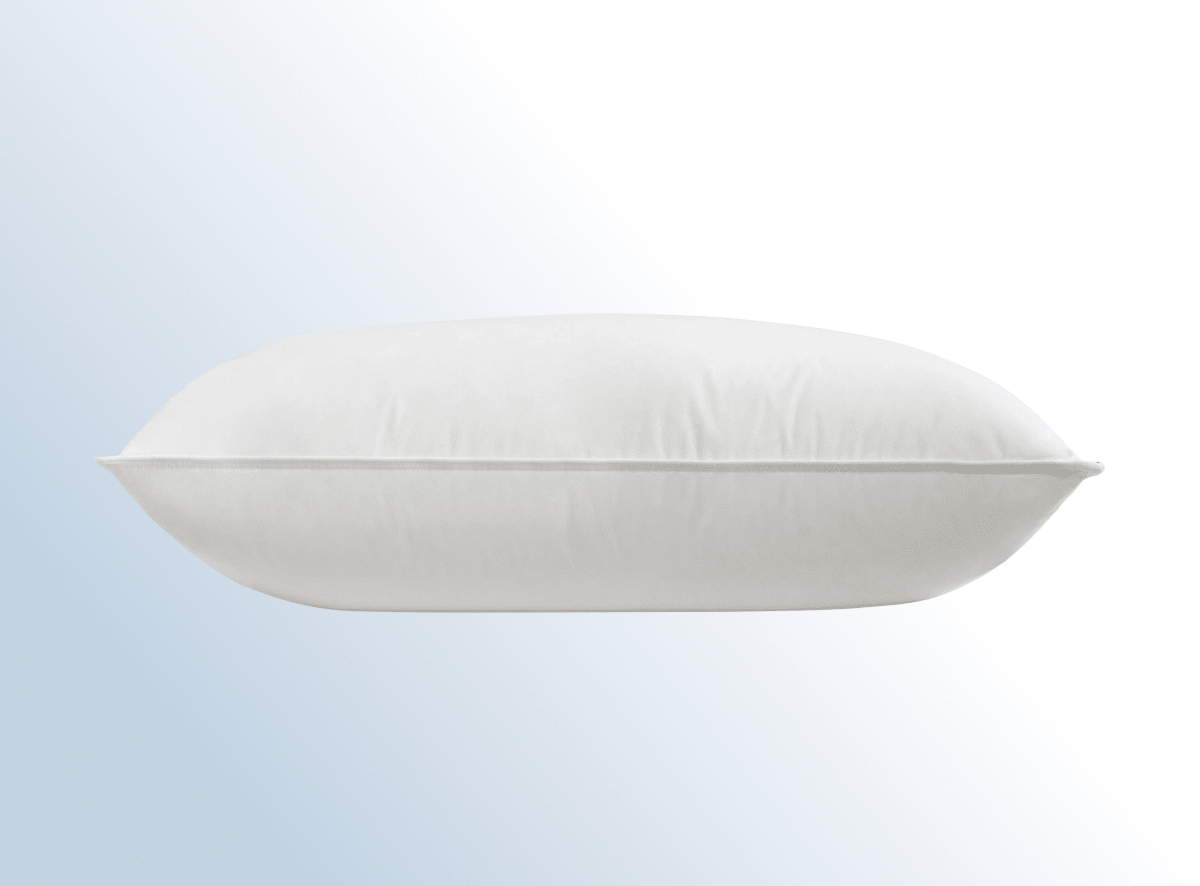 The Down and Feather Pillow on a blue gradient background
