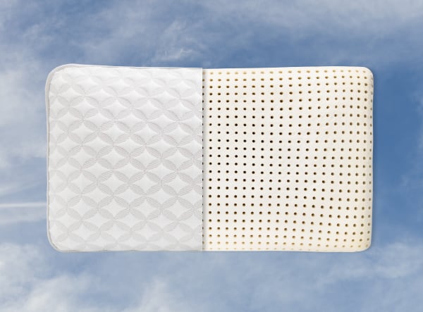 The pillow's molded internal core is made with natural Talalay latex for a durable, responsive, and supportive feel.