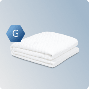 The Helix GlacioTex Waterproof Mattress Protector on a blue background.