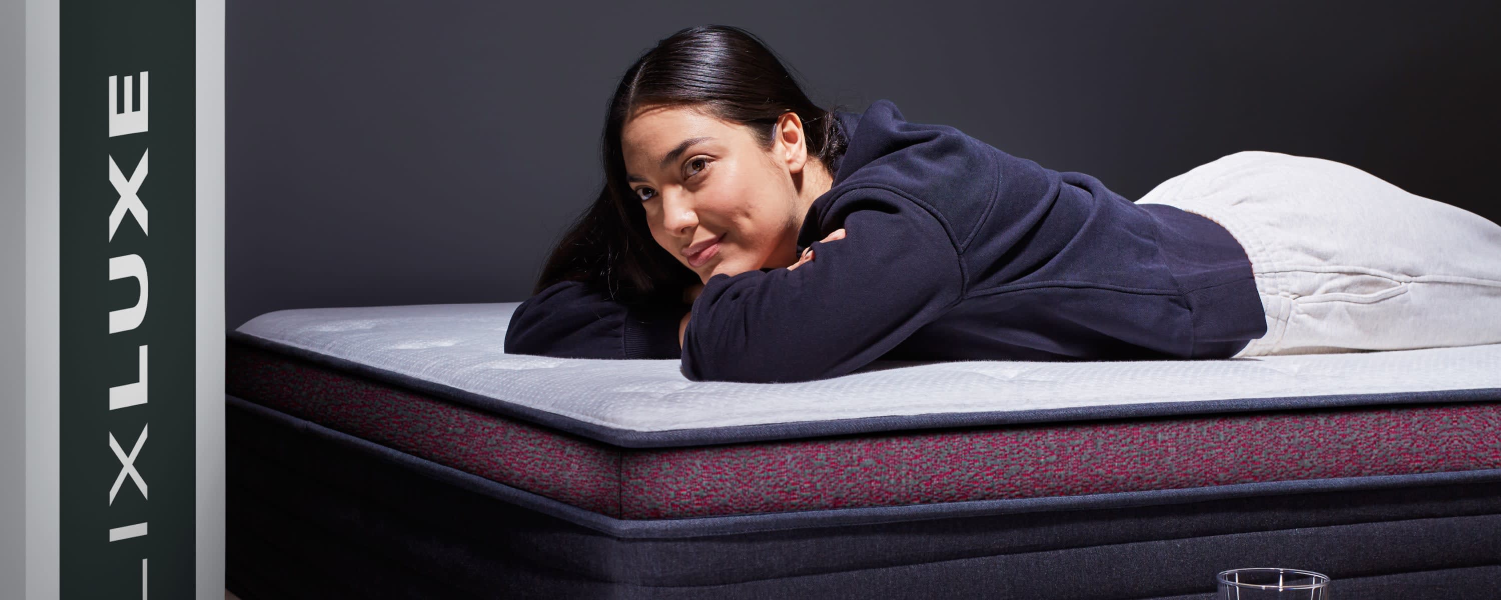 Person laying on Dusk Luxe mattress