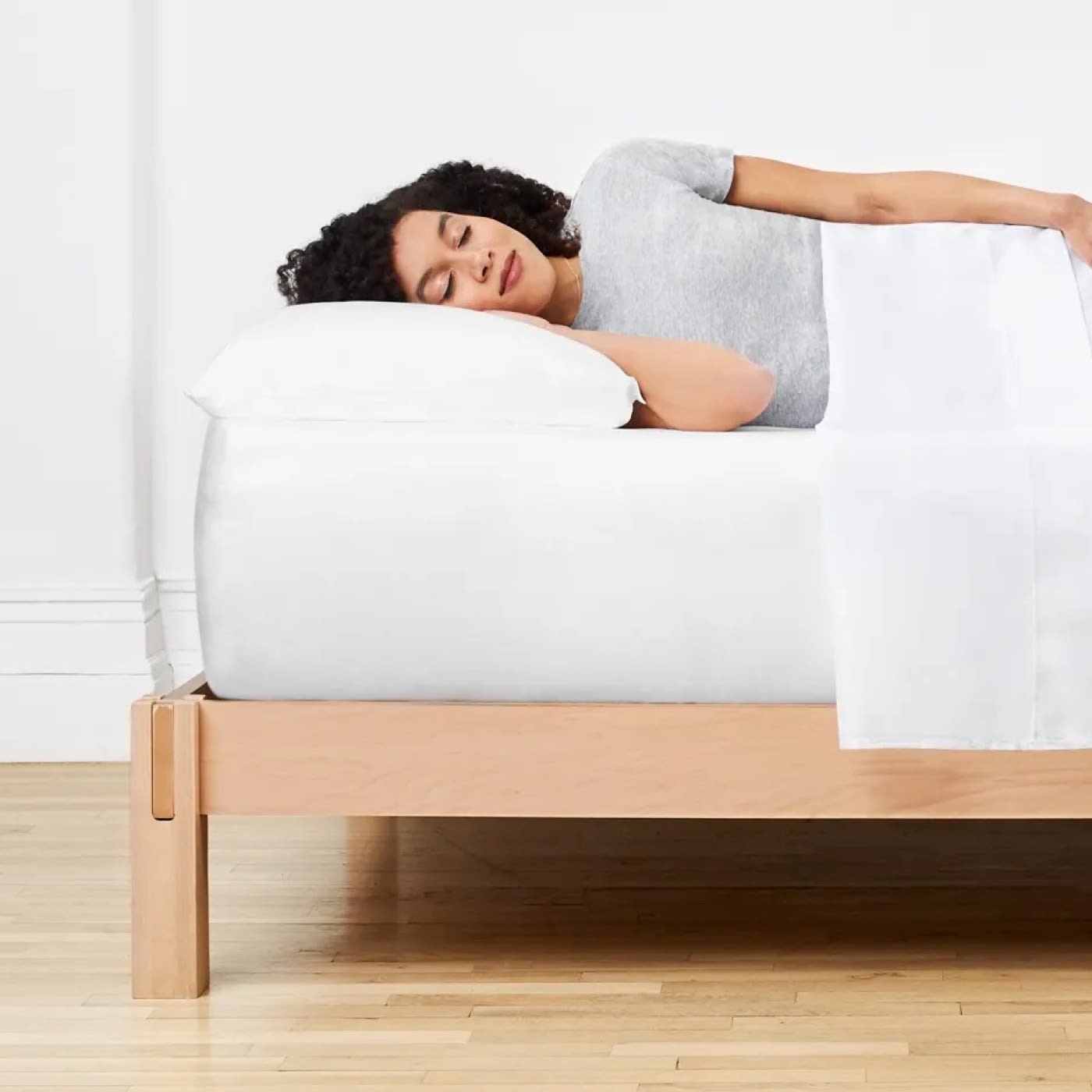 Sleeper on Helix Mattress