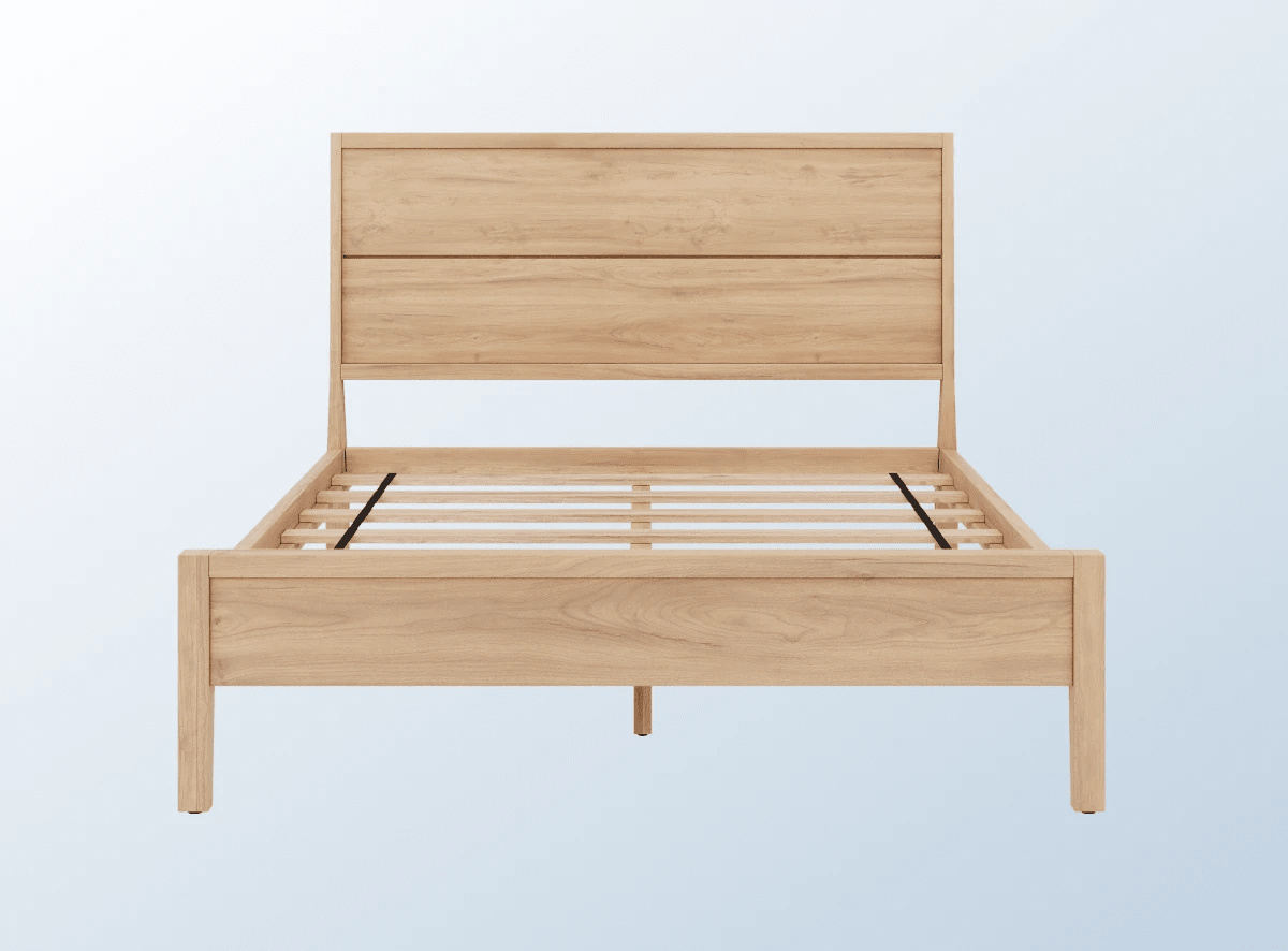 A rendered image of the Ludlow Bed Frame in a bedroom scene