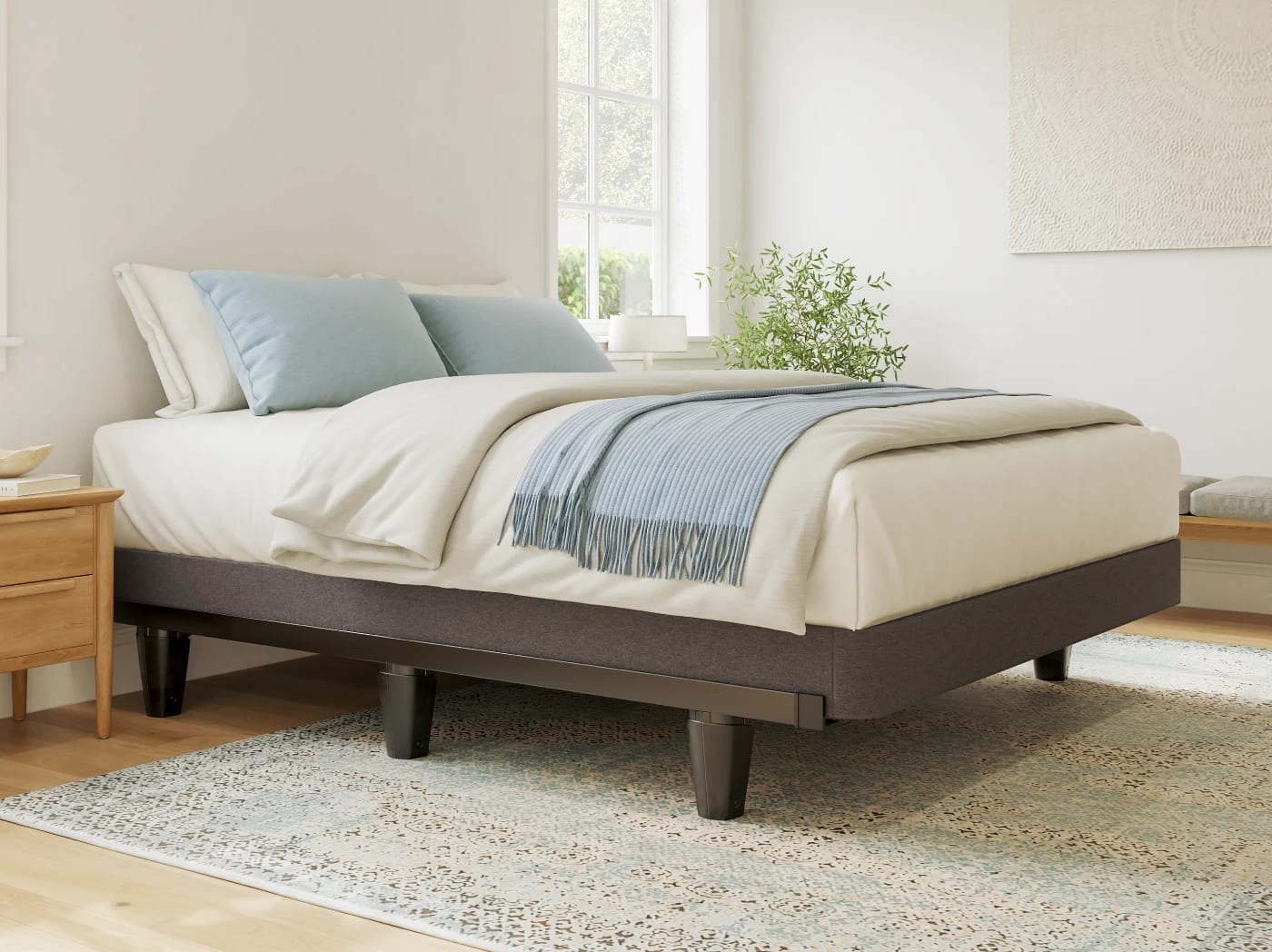 A rendered image of the Helix bed frame in a bedroom scene