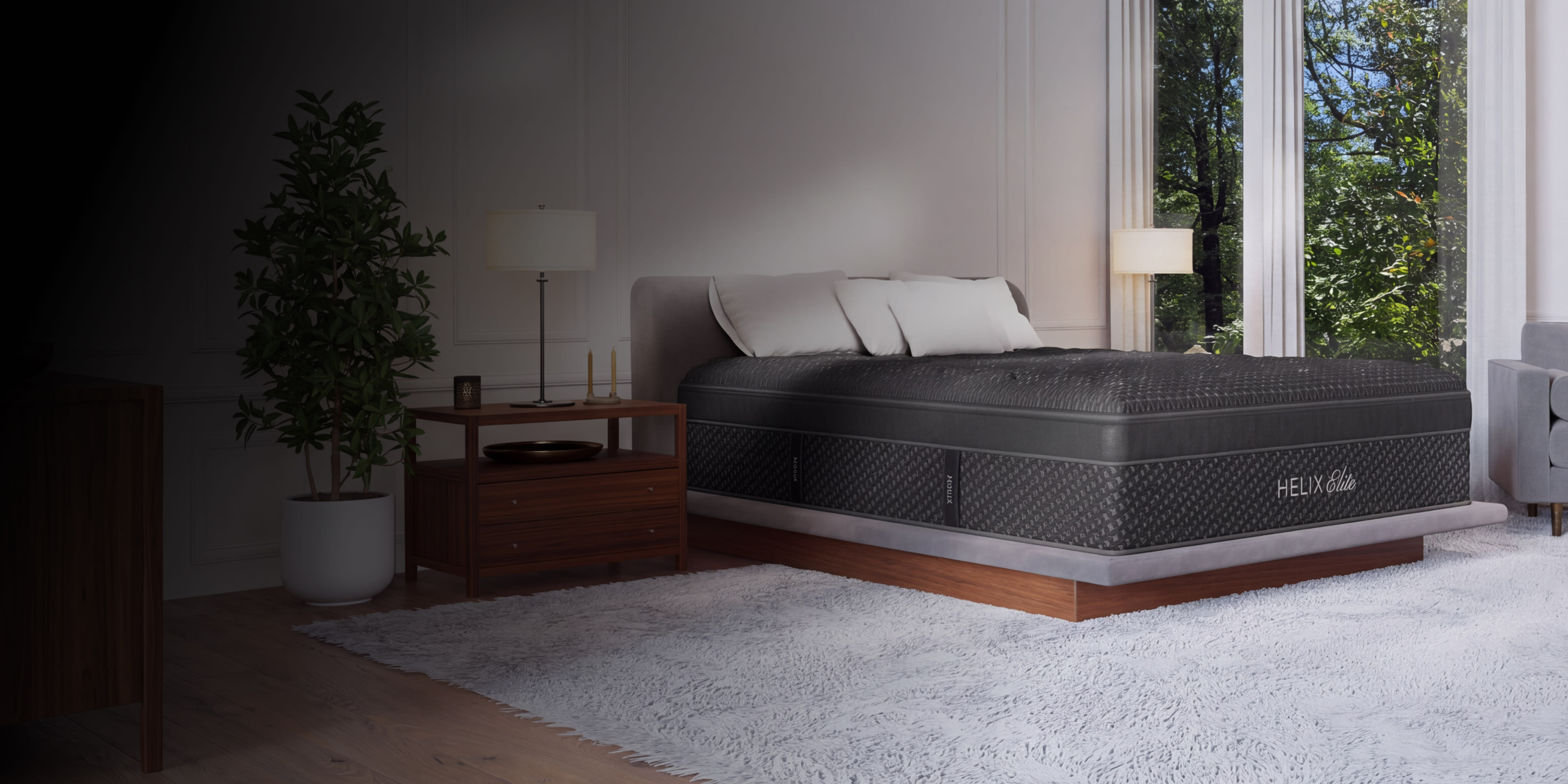 A rendered image of the Helix Midnight Elite in a bedroom scene