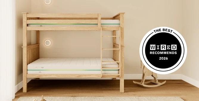 A rendered image showing the Helix Kids low profile mattress on the top of a bunk bed