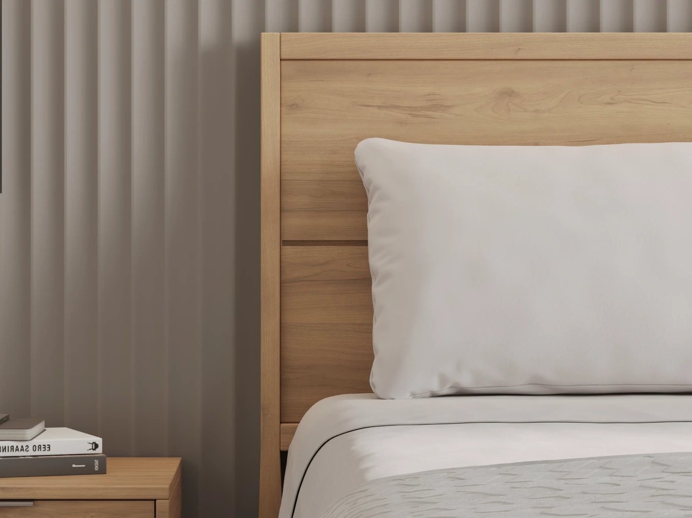 A closeup of the Ludlow Bed Frame in a bedroom scene