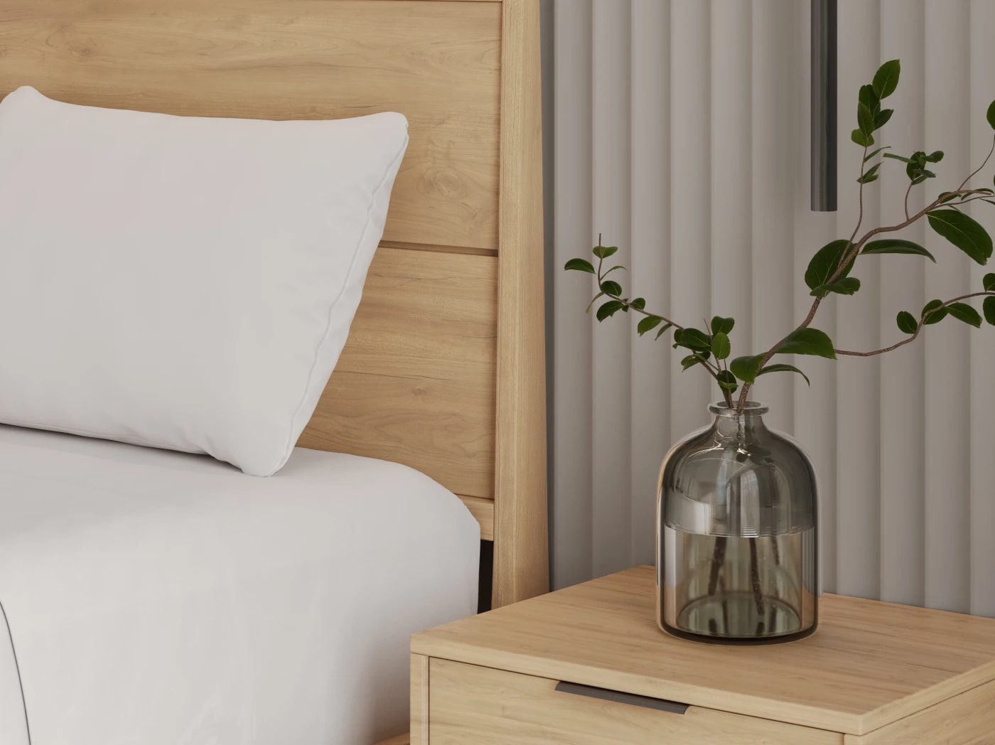 A closeup of the Ludlow Bed Frame in a bedroom scene