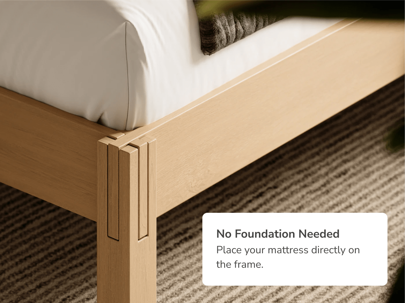 A rendered image of the Madison Bed Frame with a callout that it replaces your foundation or box spring