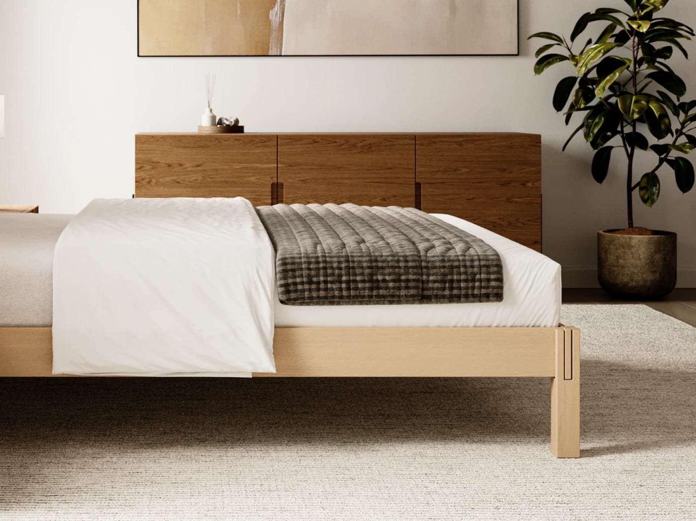 A rendered image of the Madison Bed Frame in Natural in a bedroom scene