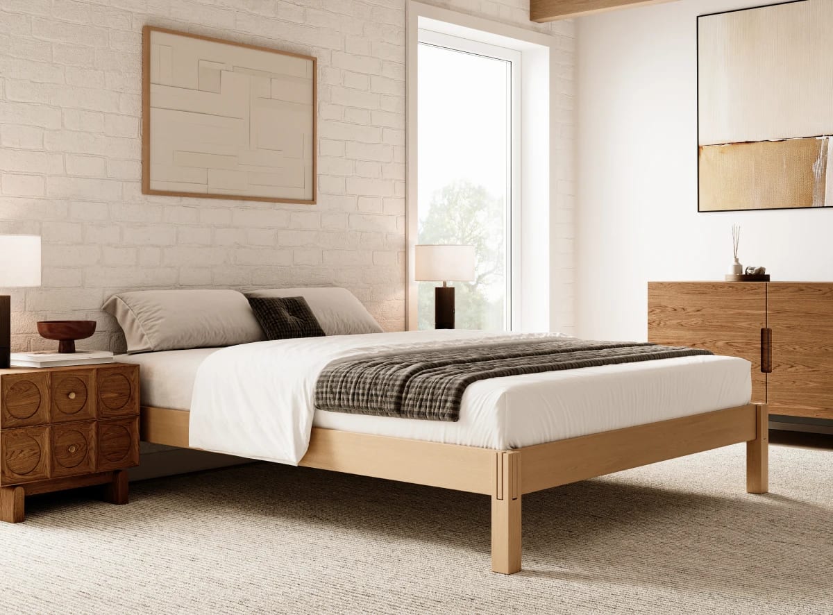 A rendered image of the Madison Bed Frame in a bedroom scene