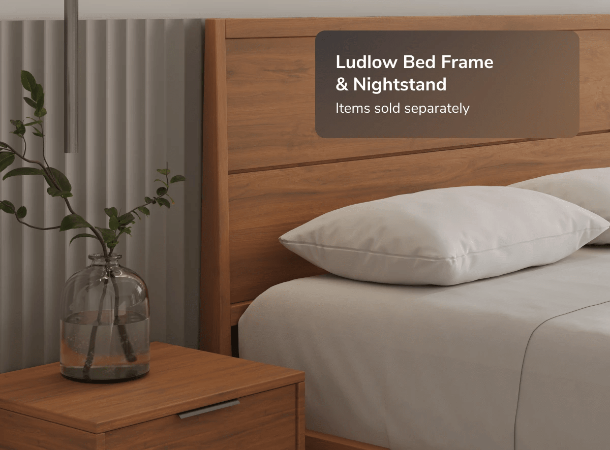 A rendered image of the Ludlow Bed Frame with a callout that the Ludlow Bed Frame and Nightstand are sold separately